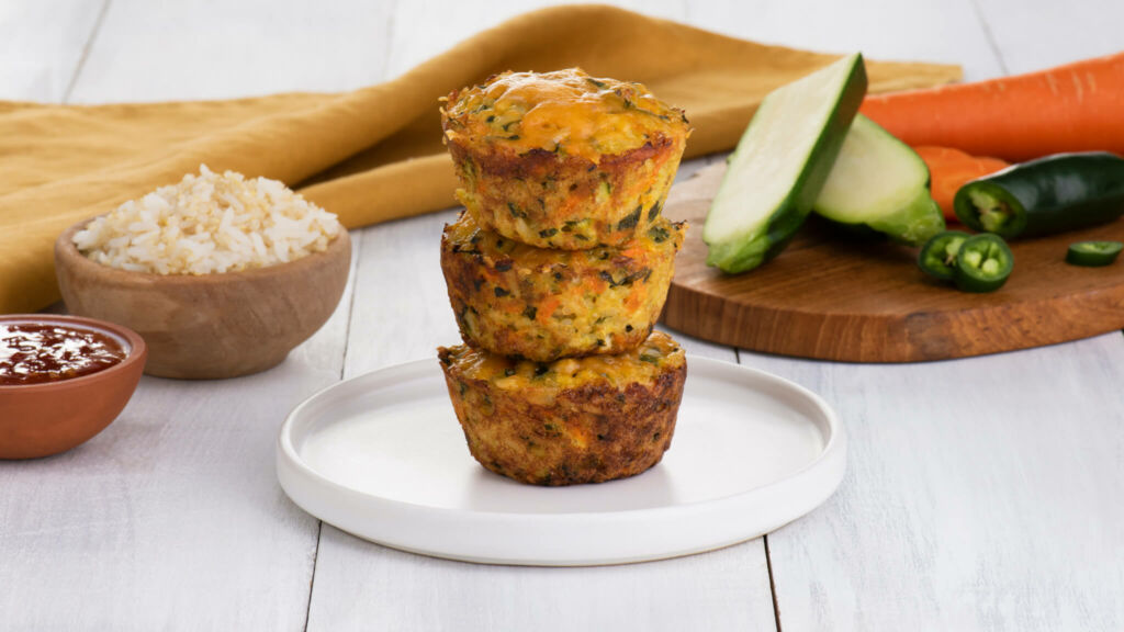 Vegetarian jasmine rice and quinoa cakes with zucchini, carrots, jalapeños and cheddar cheese