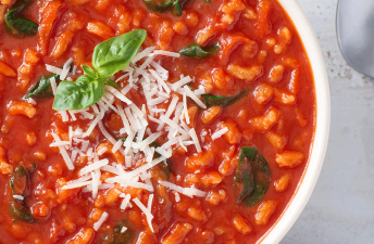 Tomato Rice Soup with cheese and basil