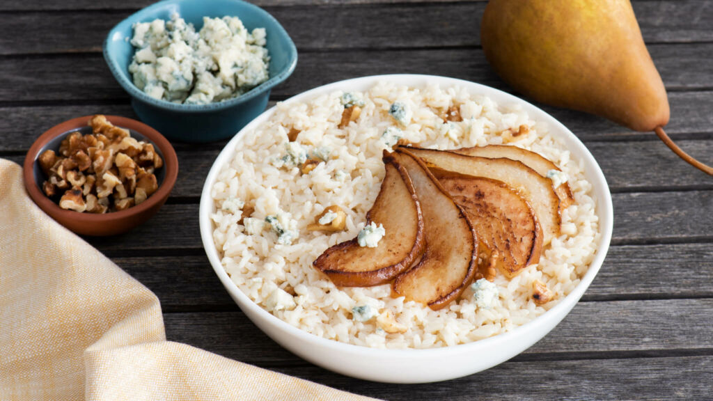 Risotto with Pears, walnuts and crumbled Blue Cheese in a bowl