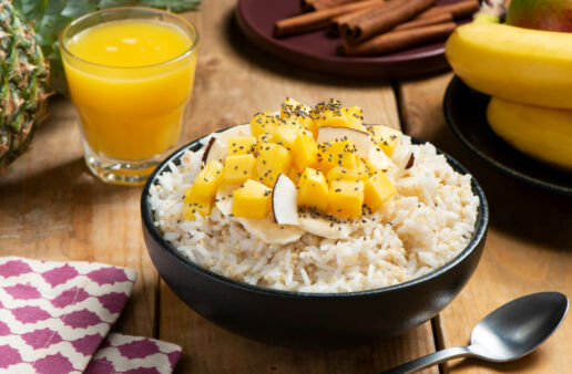 Breakfast bowl with jasmine rice, quinoa, mango and shredded coconut
