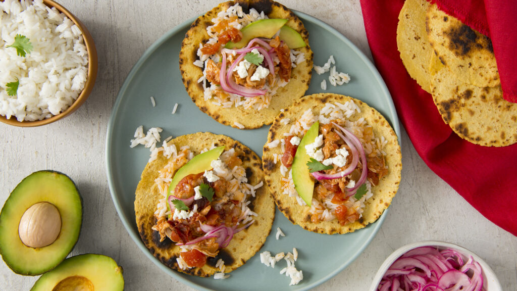 Tacos-filled-with-chicken-tinga-and-white-rice