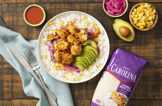 vegetarian-rice-bowl-with-buffalo-cauliflower-avocado-corn-and-pickled-onions